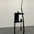 A World Held Up, reclaimed wood, tree branch, black spray paint, 2026, 4
