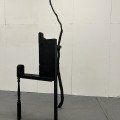 A World Held Up, reclaimed wood, tree branch, black spray paint, 2026, 7